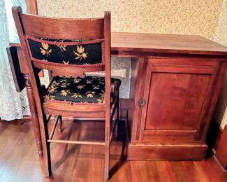 Desk & chair with needlepoint seat & back in main house