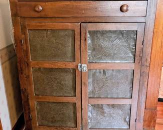 Pie safe with punched tin panels in the main house