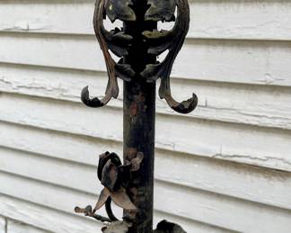 Details of rot iron lamp in garage