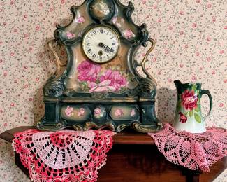 Porcelain clock, doilies, pitcher and shelf all in main house