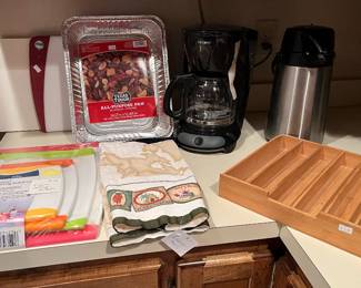 Cutting boards, coffee pot kitchen, utensils, in guest house