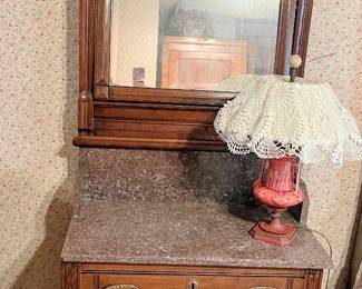 Eastlake style dresser and lamp in main house