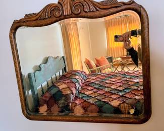 Antique mirror with bubble glass in the guest house