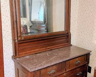 Eastlake style marble topped dresser in main house