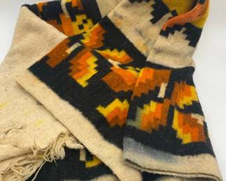 vintage Mexican wool blanket featuring an orange southwestern geometric pattern