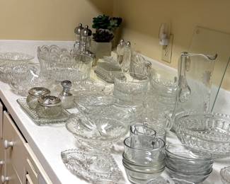 Colletion of cut glass and cut crystal vessels, pitchers, bowls