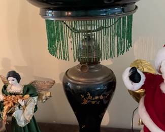 Deep emerald green glass lamp, not electrified from kerosene, with green glass beads on bottom edge of glass shade 