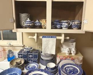 Collection of blue glass and additional accessory pieces to Blue Willow pattern