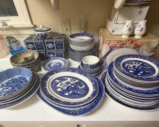 Blue Willow china w/place settings for 12 and numerous accessory serving pieces and complementary patterned pieces
