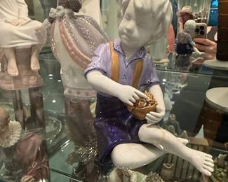 Porcelain Figurine of a Boy with Basket by Lladro