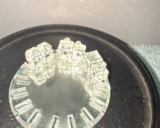 Crystal Clock Face with Roman Numerals and Sculptural Elements