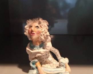Figurine of a Woman with Curly Hair