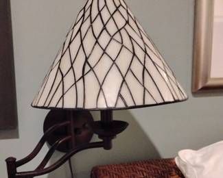 Apears to be a Robert Louis Tiffany swing arm wall lamp pair