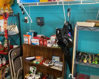 Lightbulbs, electrical items, items, folding chairs, and a shelf