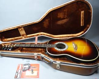 Ovation acoustic guitar and case