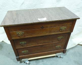 Beautiful antique 3-drawer dresser with hand carved drawer front and frame. Beautiful, heavy granite top. You won't find a more beautiful dresser anywhere. Don't miss your chance to purchase this heirloom piece.