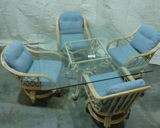 Heavy glass 54" x 54"casual dining table with rattan chains.