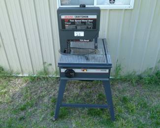 Craftsman 12 inch, 2-speed Bandsaw with tilt and 6" depth of cut. Has large work surface and built in work light. Tested and works.