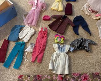 Assorted marked and unmarked Barbie clothes