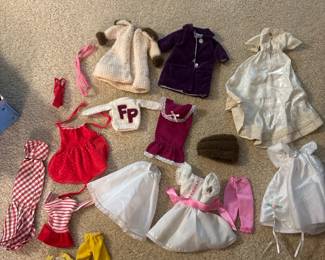 Assorted marked and unmarked Barbie clothes