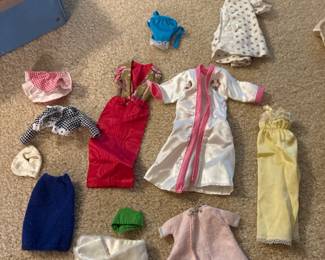 Assorted marked and unmarked Barbie clothes