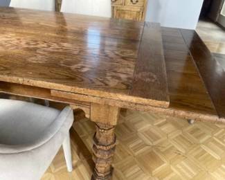 Distressed oak dining table 72" x 42" x 30". Trundle table with (2) 24" extensions asking $600
