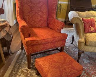 Antique red wingback chair with footstool 