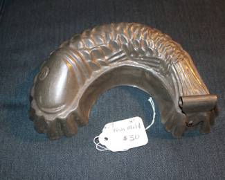 Item 27: Antique Tin fish Mold. Item 27: 8" one side fish mold.