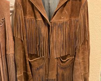 Fabulous 1970s leather fringe jacket and vest. Great condition. 