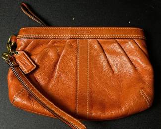 205 coachleatherwristletclutchwithbrass