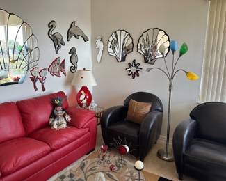 Red leather sofa, black leather arm chairs