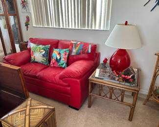 Rattan side table, decorative pillows