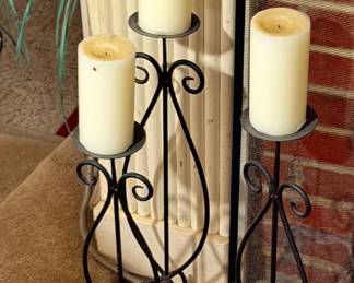 3 candle holders with candles
