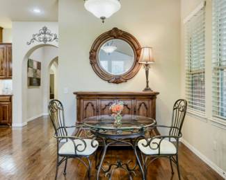 Bistro glass and wrought iron table