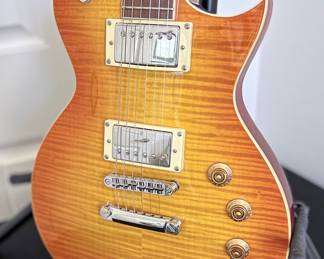 ESP LTD EC-256 Flamed Maple Single-Cut Electric Guitar A classic single-cutaway solid-body electric guitar by ESP LTD,
