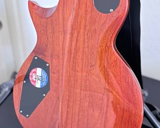 ESP LTD EC-256 Flamed Maple Single-Cut Electric Guitar A classic single-cutaway solid-body electric guitar by ESP LTD,