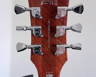 ESP LTD EC-256 Flamed Maple Single-Cut Electric Guitar A classic single-cutaway solid-body electric guitar by ESP LTD,
