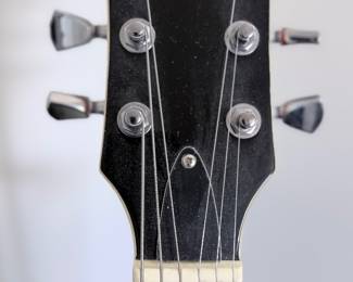 ESP LTD EC-256 Flamed Maple Single-Cut Electric Guitar A classic single-cutaway solid-body electric guitar by ESP LTD,