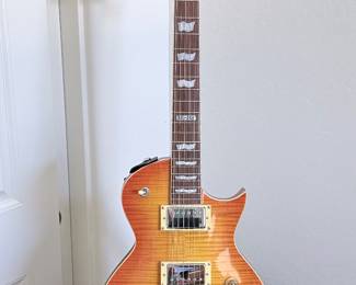ESP LTD EC-256 Flamed Maple Single-Cut Electric Guitar A classic single-cutaway solid-body electric guitar by ESP LTD,