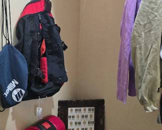 Basement bedroom closet.  Sleeping bags and stuff.