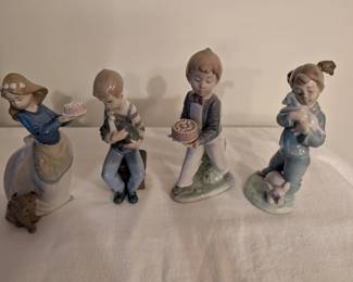 Lladros Boxes included with each one: 1045 Girl with Cake, #01131 Boy with Cake, Girl with Elephant 01129, Boy with 1050