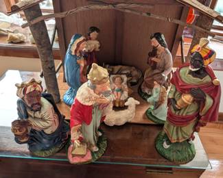 11 figures, tallest is 17" Made in Japan 1950's 15" T, 21" W,9" deep. Figures are all perfect, no scratches. One has hole in bottom, can't be seen. Tallest figure 17"