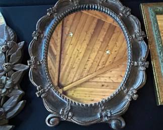 Ornate Oval Giltwood Mirror with Floral Motifs