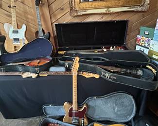 Assorted Electric Guitars including Squier and Telecasterstyle, and Mandolin