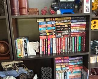 Collection of Romance and Science Fiction Novels by Christine Feehan, Linda Howard, Elizabeth Moon, Anne McCaffrey, Amanda Quick, and J.D. Robb