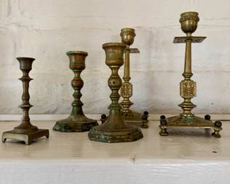 Small antique brass candlestsicks.