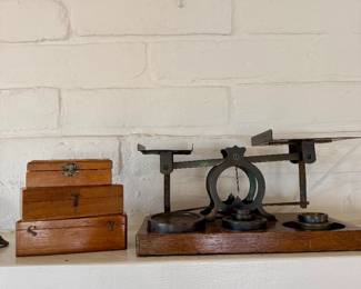 Antique scale with 4 sets of weights