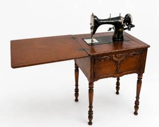 169 AntiqueNewHomeSewingMachineCabinetTableVintage