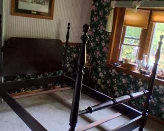 mahogany four poster bed is a classic American Federal style piece featuring carved pillars