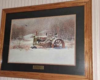 framed artwork is a limited edition print titled "Winter Gathering" by artist Greg Bordignon, featuring a rusted tractor in a snowy landscape.It was recognized as the 1998 Iowa Ducks Unlimited Print of the Year